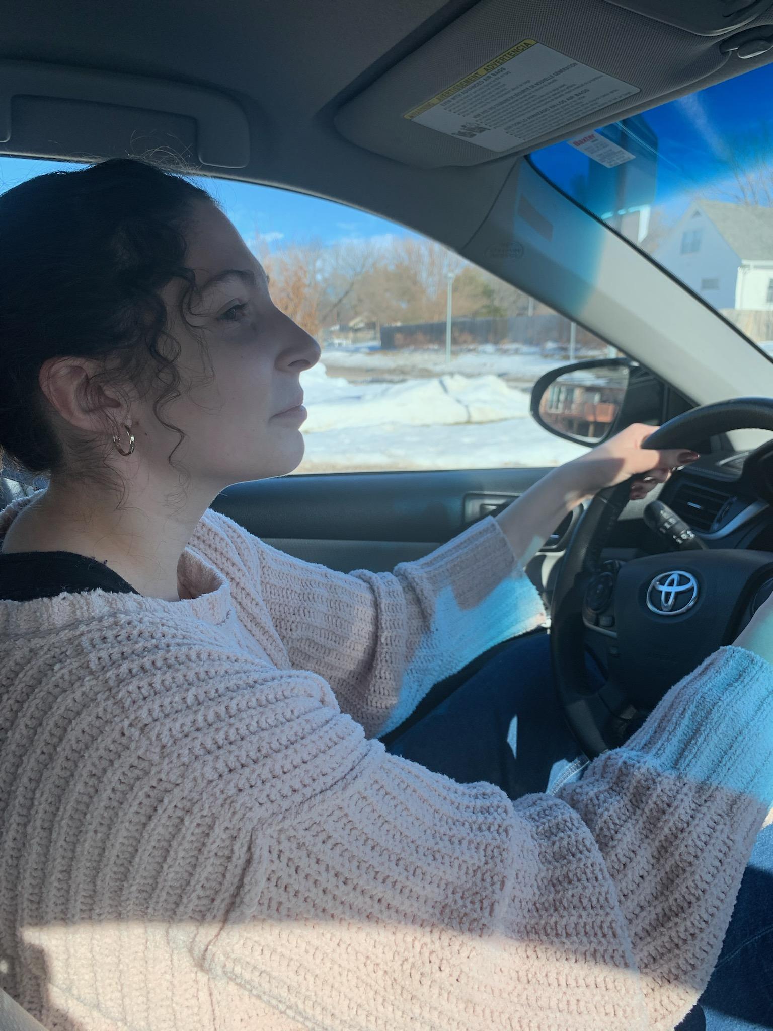 Photo of student driving car